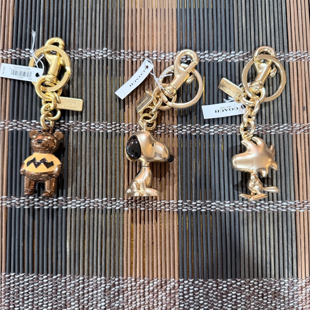 Coach Peanuts bag charm set.